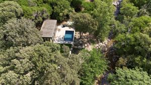 an overhead view of a house in the woods at chalet Arena in Porto-Vecchio