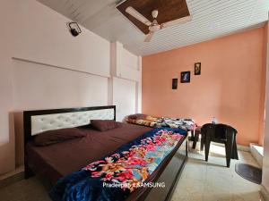 Letto o letti in una camera di Shri Mahaveer Residency