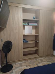 a closet with a fan in a room at La casita de jo in Cartagena de Indias