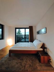 Postel nebo postele na pokoji v ubytování Luxury Escape - Titlis Panorama
