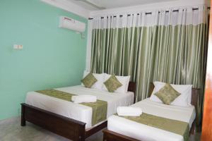 Voodi või voodid majutusasutuse Serenity Hill Oasis toas