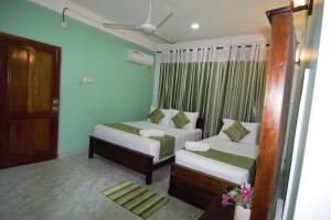 Voodi või voodid majutusasutuse Serenity Hill Oasis toas