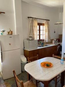 Kuchyňa alebo kuchynka v ubytovaní Aegean Cottage
