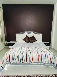 Postel nebo postele na pokoji v ubytování Ava Homestay
