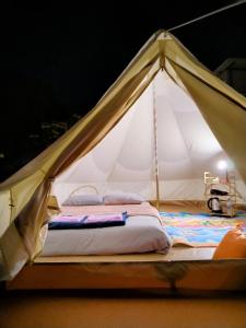 Postel nebo postele na pokoji v ubytování phatang sky view camp ผาตั้งสกายวิวแคมป์