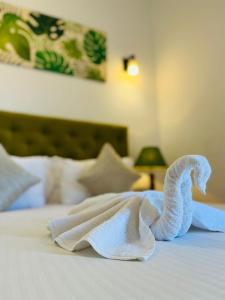 Postel nebo postele na pokoji v ubytování Blue Bird Hotels