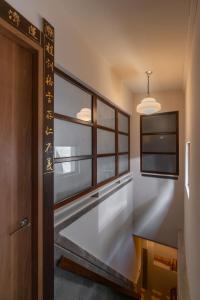 Postel nebo postele na pokoji v ubytování 安樓文旅 Enzo House