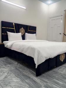 Letto o letti in una camera di JS Rezidor