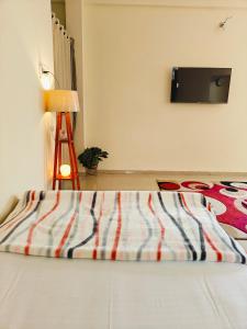 TV a/nebo společenská místnost v ubytování Ava Homestay