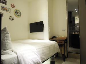 TV a/nebo společenská místnost v ubytování Re-Change Hotel Taipei