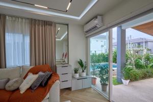 Χώρος καθιστικού στο Phuket Paradise Retreat