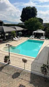 Bazén v ubytování AGRITURISMO I CAMINI nebo v jeho okolí