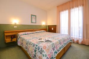 Posteľ alebo postele v izbe v ubytovaní Hotel Splendor