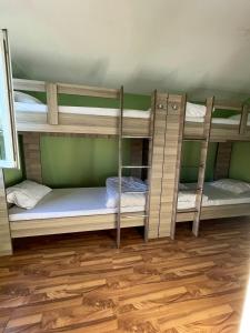 Ένα ή περισσότερα κρεβάτια σε δωμάτιο στο Pick me HOSTEL