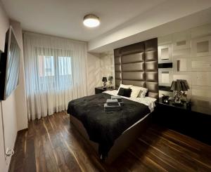 Ένα ή περισσότερα κρεβάτια σε δωμάτιο στο Central Luxury Apartment - Private parking - Self check in - Bujorului Residence