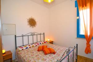 Postel nebo postele na pokoji v ubytování Casa Orizzonte