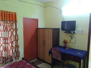 TV a/nebo společenská místnost v ubytování Anju home for Tourists