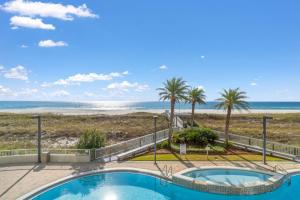 a pool with a view of the beach at Spanish Key 105 in Perdido Key
