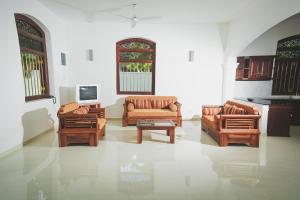 Posezení v ubytování Villa Frangipani