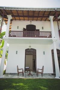 Balkón nebo terasa v ubytování Villa Frangipani