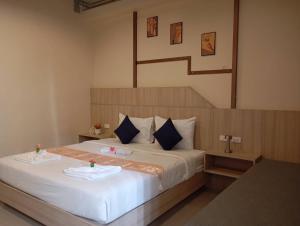 Postel nebo postele na pokoji v ubytování The Way Patong Hotel + 37 fotografií