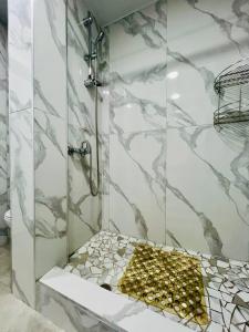 Et badeværelse på GRAND Home 3 ROOMS Apartment