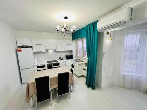 Køkken eller tekøkken på GRAND Home 3 ROOMS Apartment + 34 billeder