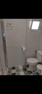 Ένα μπάνιο στο Apartamento Eluan