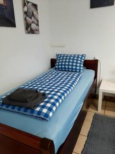 Postel nebo postele na pokoji v ubytování Fiore Gästezimmer