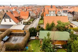 an aerial view of a city with houses and a yard at Ferienwohnung-Schwanke in Wernigerode