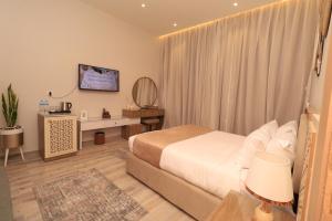 Voodi või voodid majutusasutuse Jewel Alfustat Hotel toas