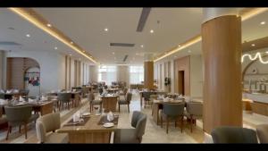 Restoran või mõni muu söögikoht majutusasutuses Jewel Alfustat Hotel