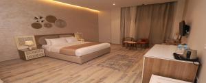 Voodi või voodid majutusasutuse Jewel Alfustat Hotel toas