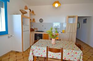 Kuchyň nebo kuchyňský kout v ubytování Casa Orizzonte