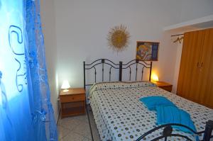 Postel nebo postele na pokoji v ubytování Casa Orizzonte