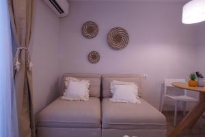 Postel nebo postele na pokoji v ubytování Budget Beach Studio 14
