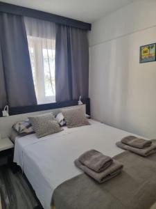 Posteľ alebo postele v izbe v ubytovaní VILLA LAURA