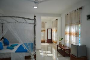 Letto o letti in una camera di Azure Resort Mirissa