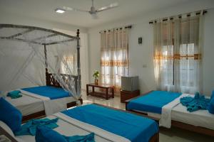 Letto o letti in una camera di Azure Resort Mirissa