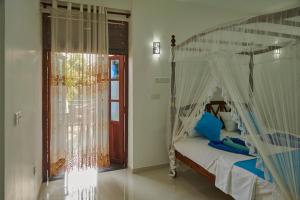Letto o letti in una camera di Azure Resort Mirissa