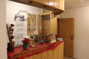 Kuchyň nebo kuchyňský kout v ubytování Hotel Garni Postkutsche