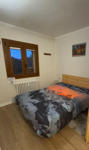 Postel nebo postele na pokoji v ubytování La Molina - acogedor apartamento cerca de las pistas de esquí
