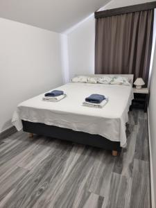 Posteľ alebo postele v izbe v ubytovaní VILLA LAURA