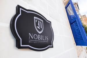 Сертификат, награда, вывеска или другой документ, выставленный в Nobilis Boutique Living