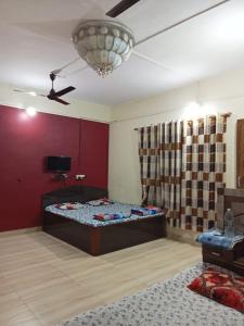 Μια τηλεόραση ή/και κέντρο ψυχαγωγίας στο Sai Sneh Holidays Cottage +97 φωτογραφίες