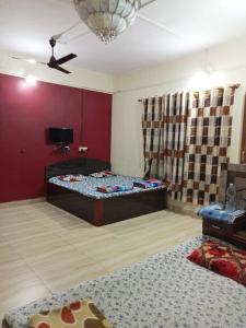 Μια τηλεόραση ή/και κέντρο ψυχαγωγίας στο Sai Sneh Holidays Cottage