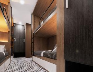 a room with two bunk beds in it at TN Hue Dorm in Hue