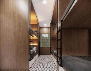 a bedroom with bunk beds and a hallway with a floor at TN Hue Dorm in Hue