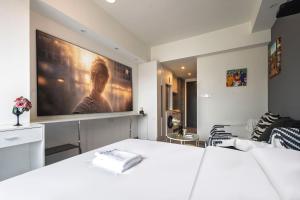 Postel nebo postele na pokoji v ubytování Suyi Hotel Apartment