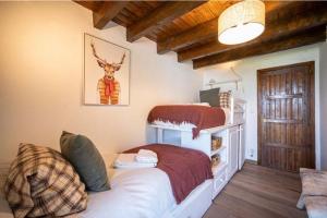 Postel nebo postele na pokoji v ubytování Casa Catania-Acogedora casa con impresionantes vistas-Fibra Optica + 10 fotografií